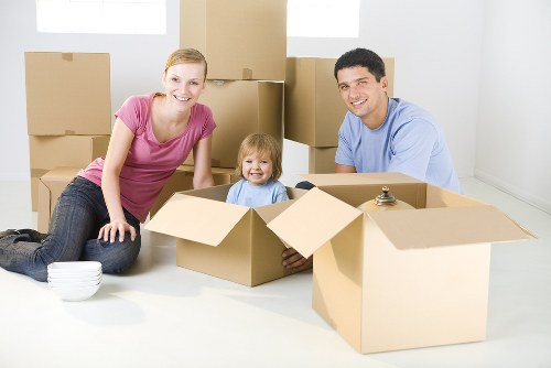 Moving boxes and furniture prepared for Barnes removals in a residential setting