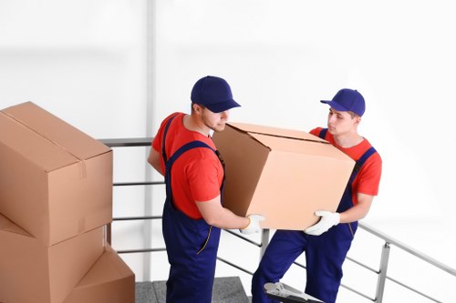 Barnes Removals staff using protective equipment and safe handling methods