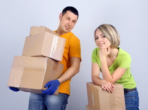 Organized removals service preparing items for delivery