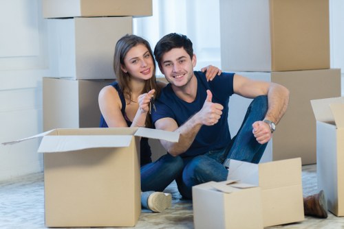 Furniture pick-up team handling items at a Barnes home