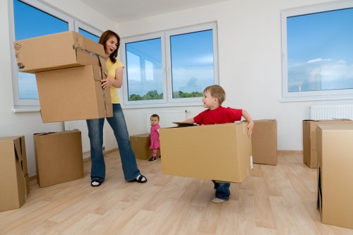 Careful wrapping of fragile household items in Barnes