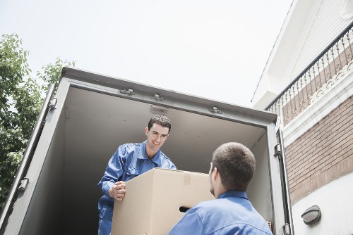 Furniture being carried through a Barnes home during a move