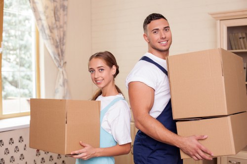 Loading furniture into a van for a Barnes local move