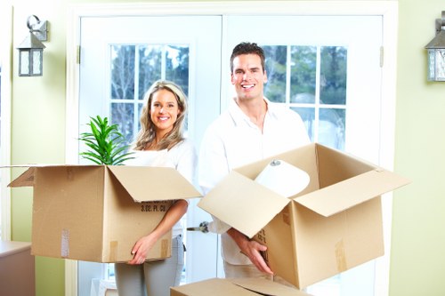 Organised boxes and labels for moving in Barnes