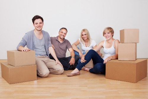 Packed boxes and furniture prepared for a house removal service