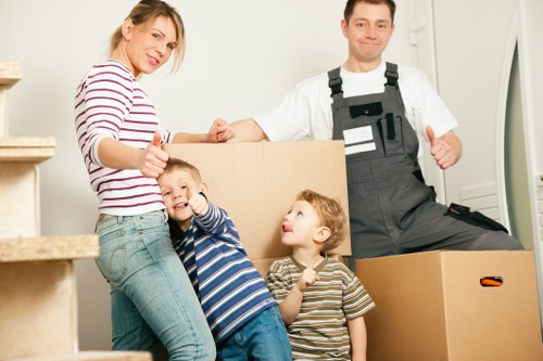 Workers pausing to review safety during a removal job